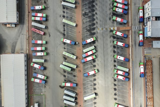 Aerial view of a bus depot and circulation lanes