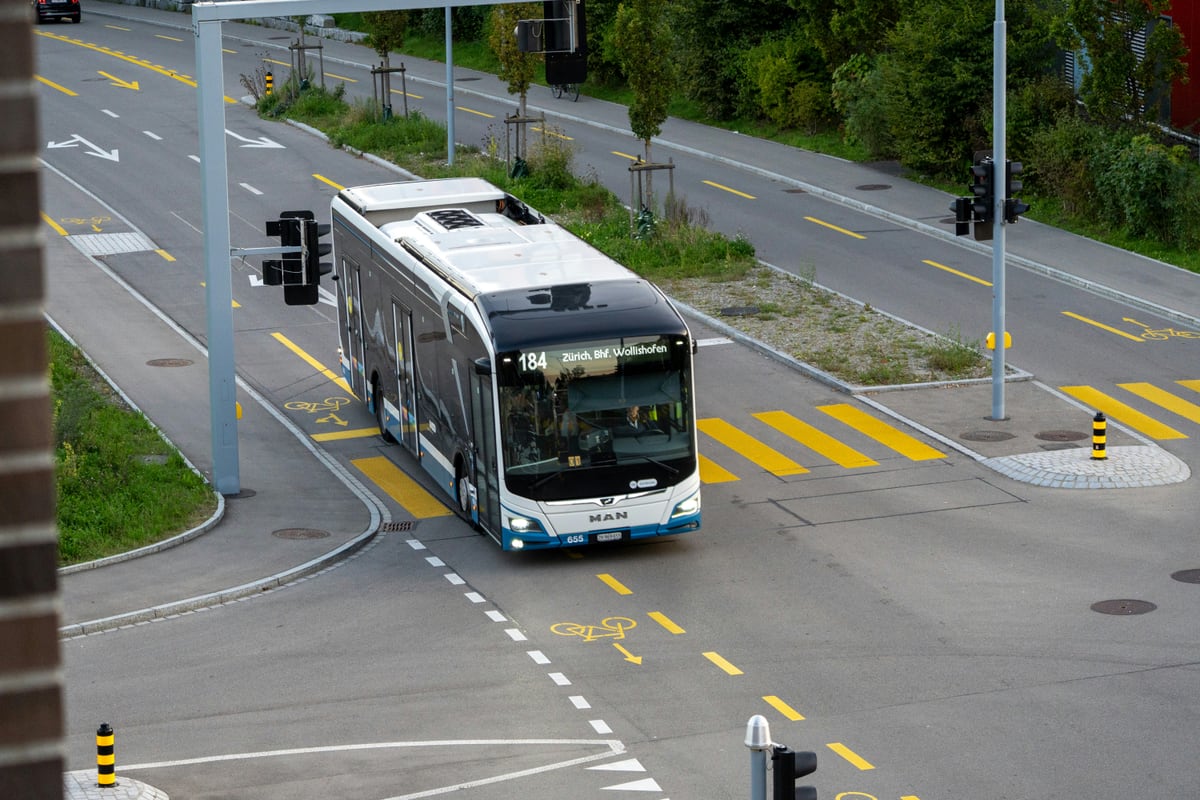 City bus on a signal-controlled street