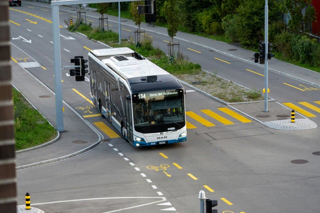 City bus on a signal-controlled street
