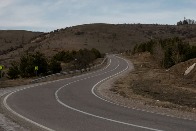 Regional road through open countryside